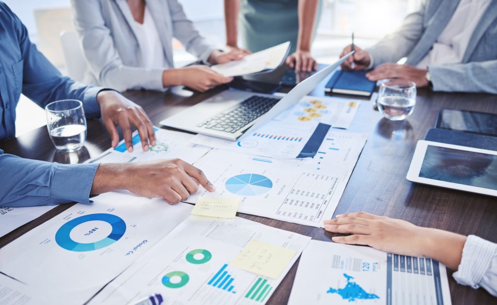 Teamwork, collaboration and infographic paper in business meeting for target audience data, KPI or